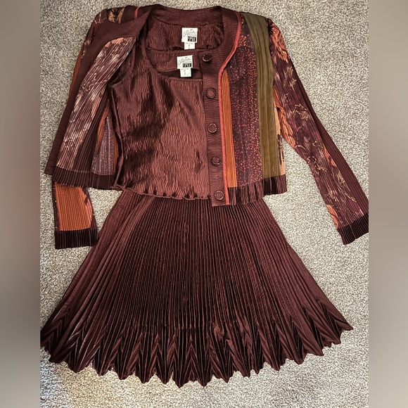 Dresses & Skirts - Designer cocktail suit Worn once